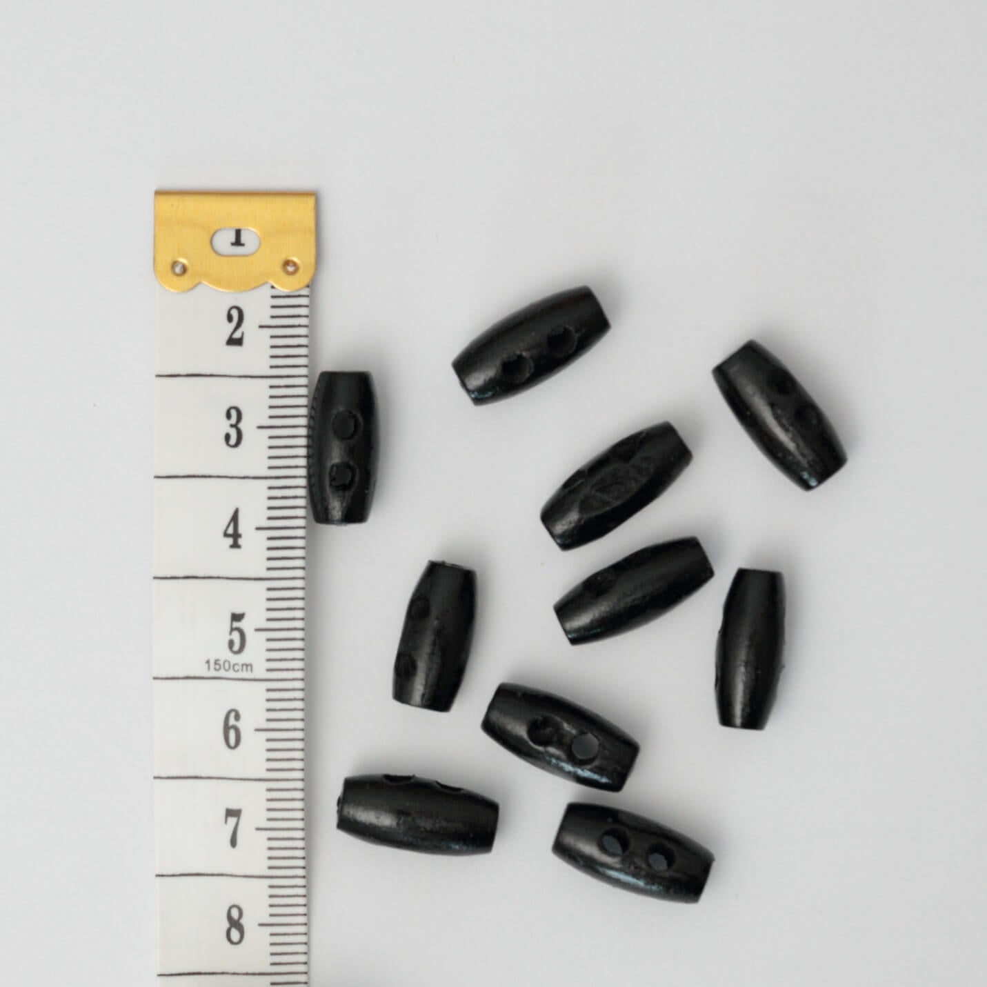 15mm Black Mini 2-Hole Toggle Buttons 10pk