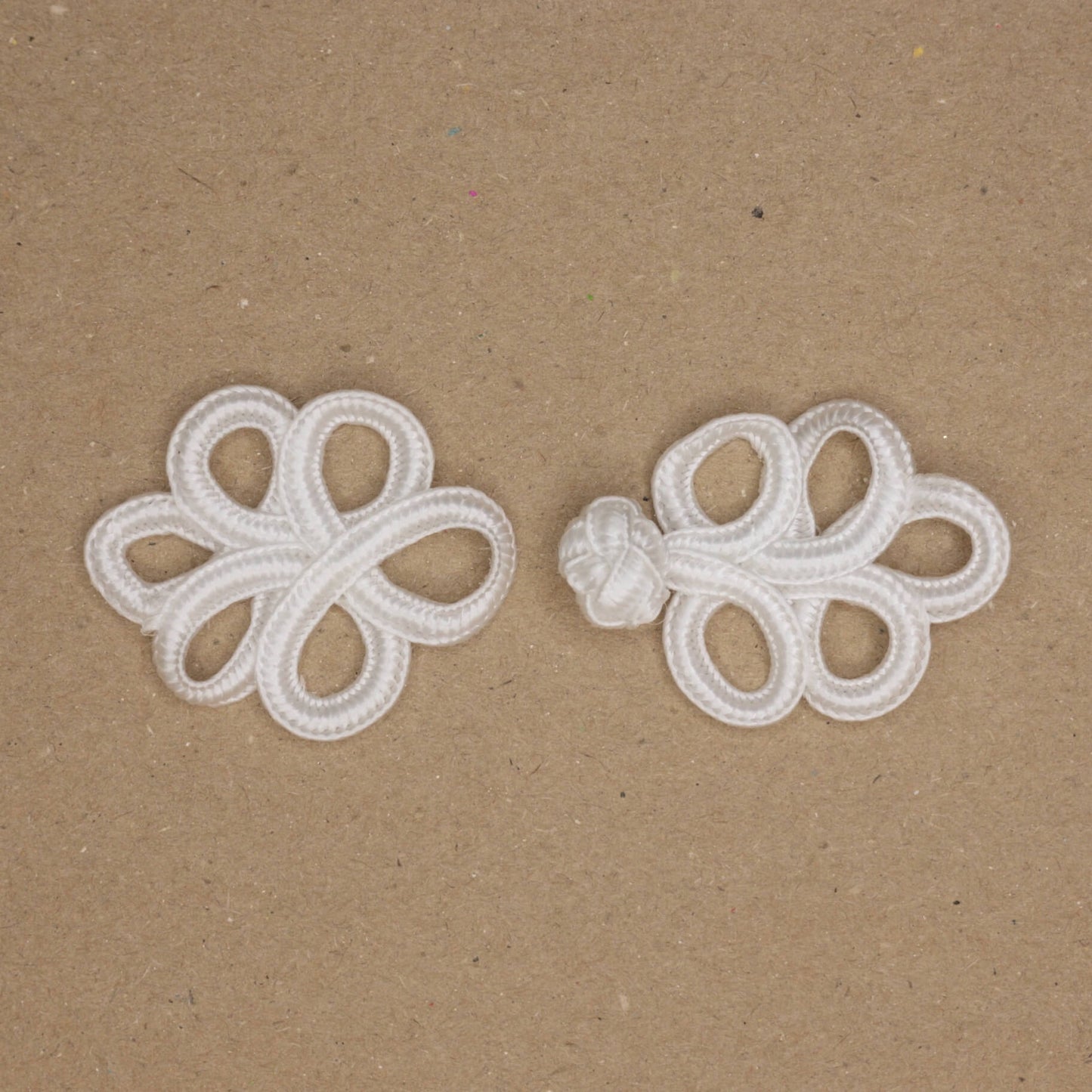 7cm x 3cm White Frog Fastener