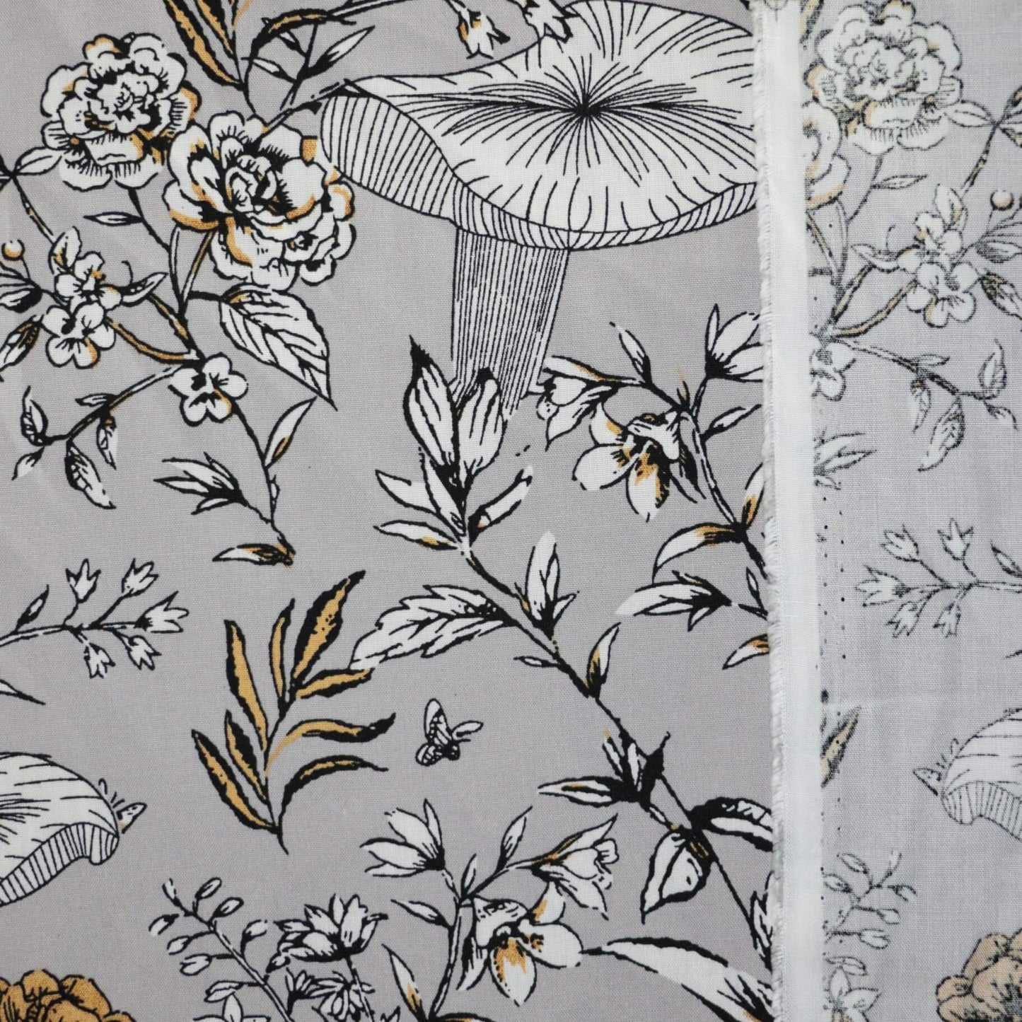 Floral and leaf pattern on a gray background