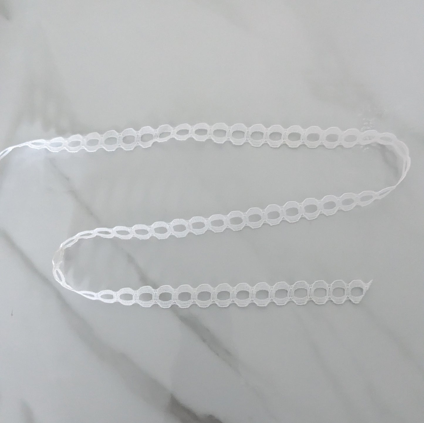 Small Hole White Trim ½" x 5m