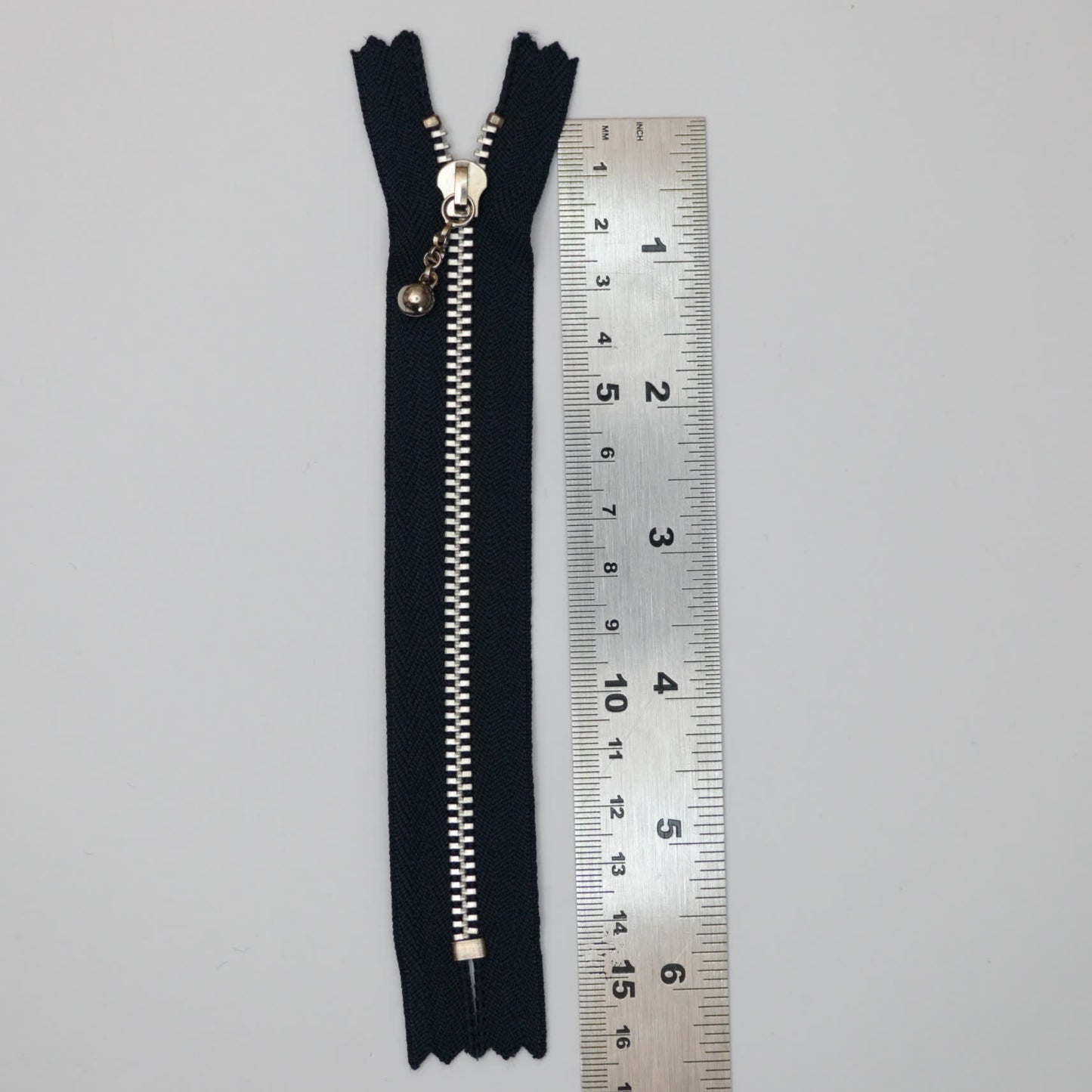 15cm (6-inch) Navy Closed-End Zips With Silver Metal Teeth And Fancy Ball-Pull