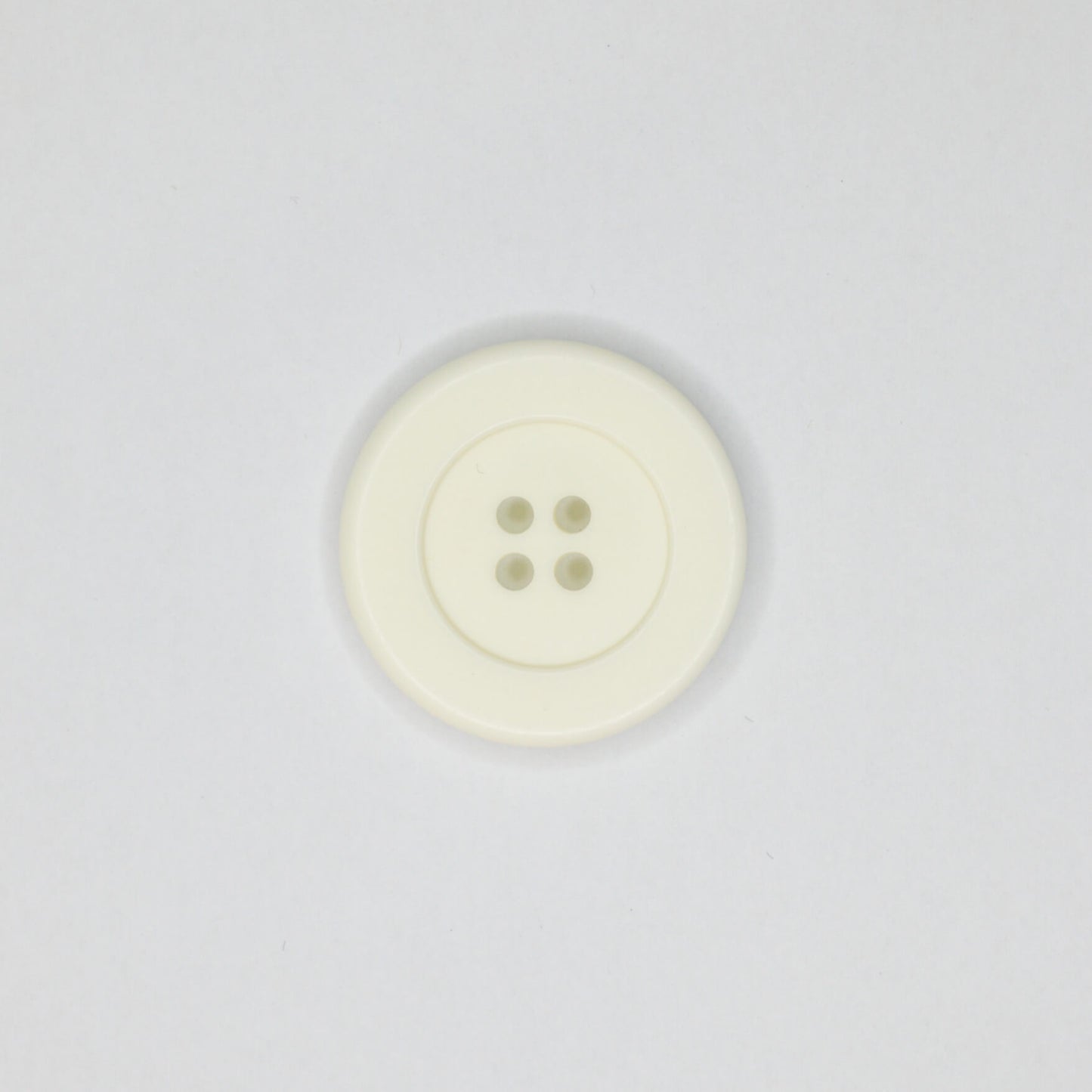 27mm Off-White Plastic 4H Buttons 10pk