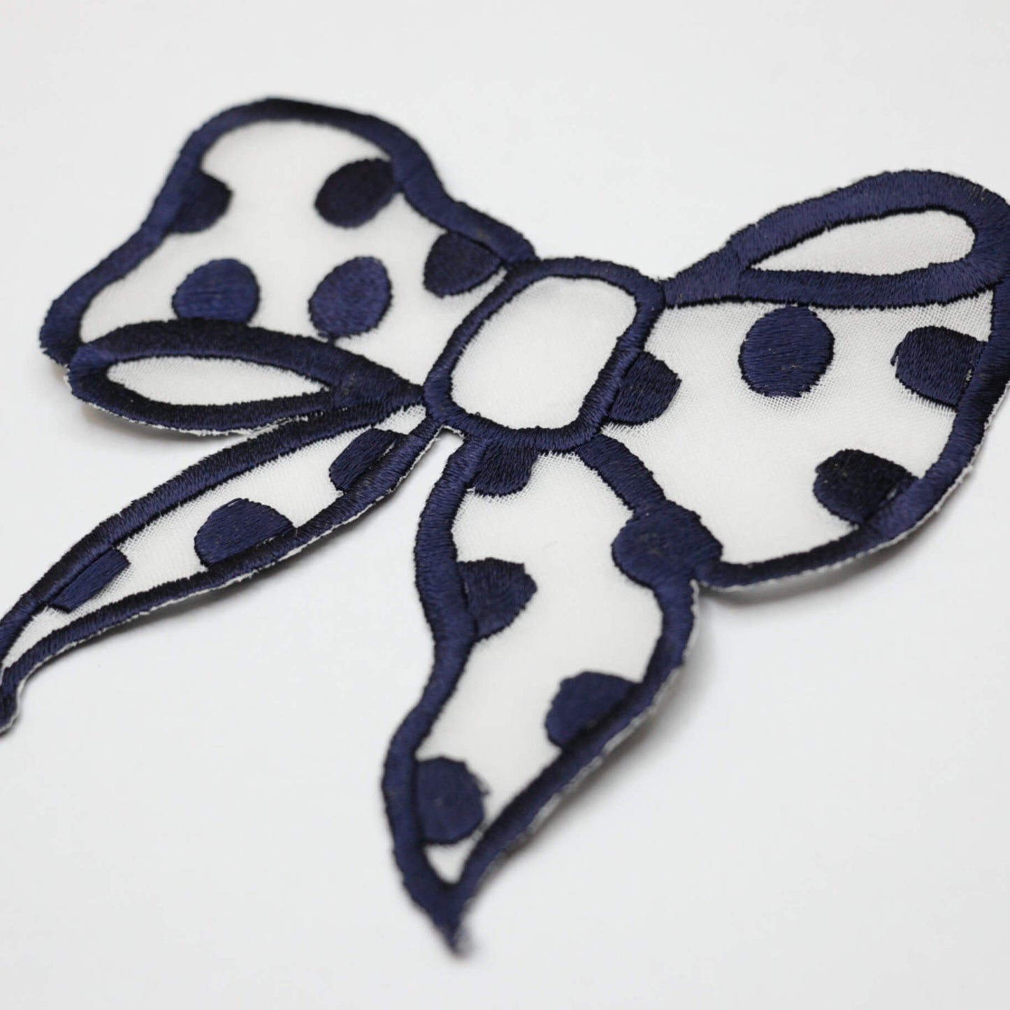 9cm x 10cm Navy Bow Motif with Spot 2pk