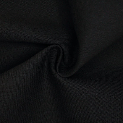 Close-up of black linen mix fabric with folds
