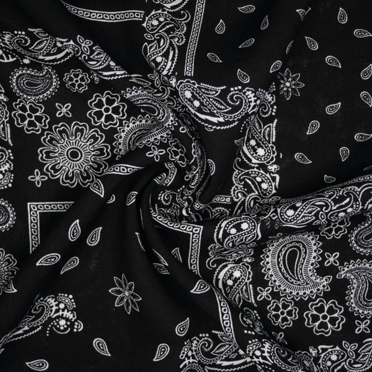 Black fabric with white paisley pattern