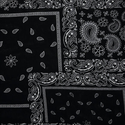 Black bandana with white paisley patterns