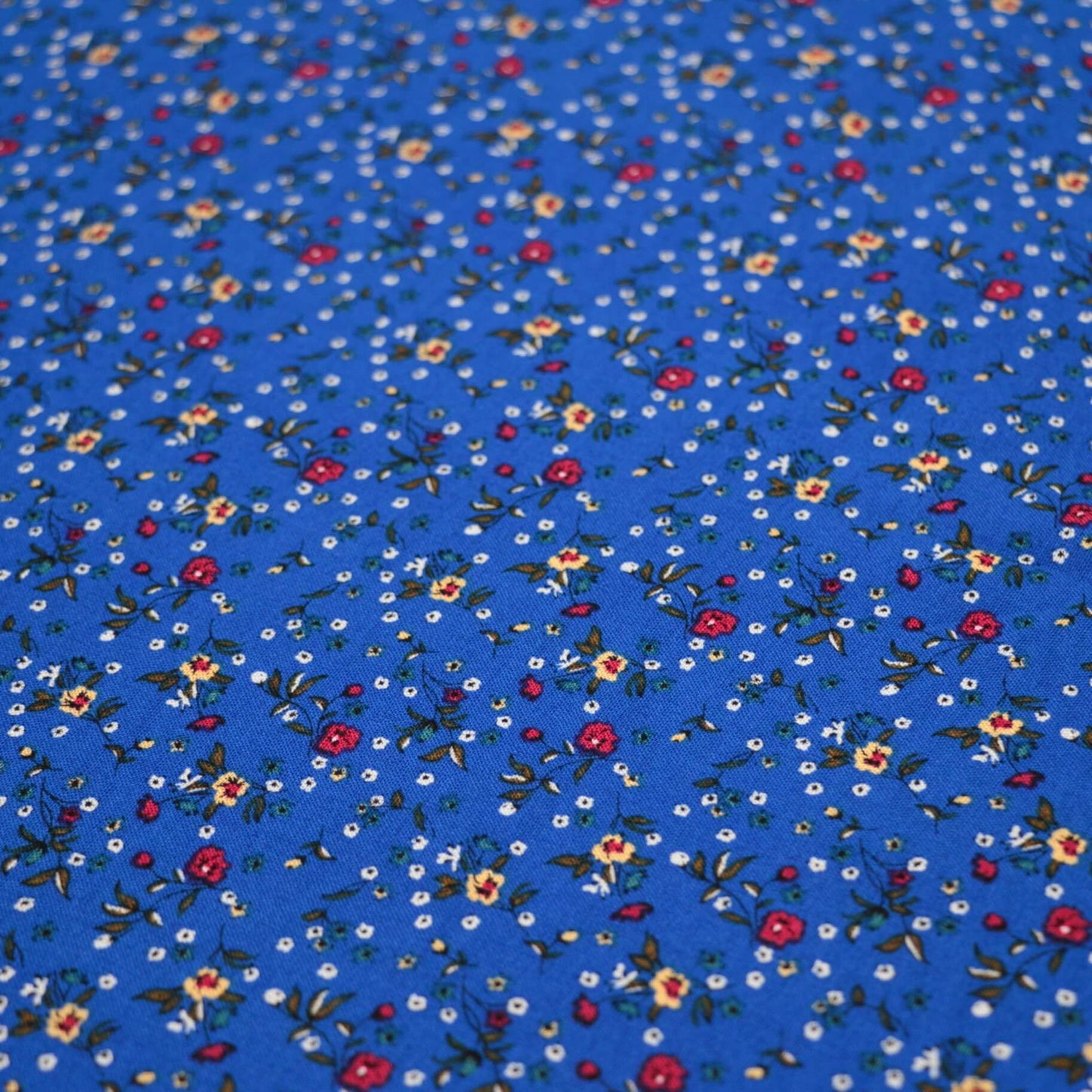 Blue Ditsy Floral Print Cotton per/metre