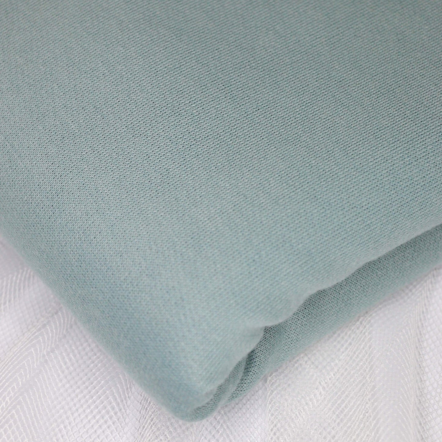 Light blue fabric on a white background