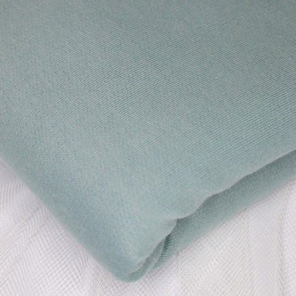 Light blue fabric on a white background