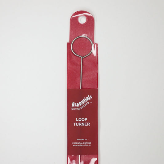 A red packaged Essentials Loop Turner tool for sewing.