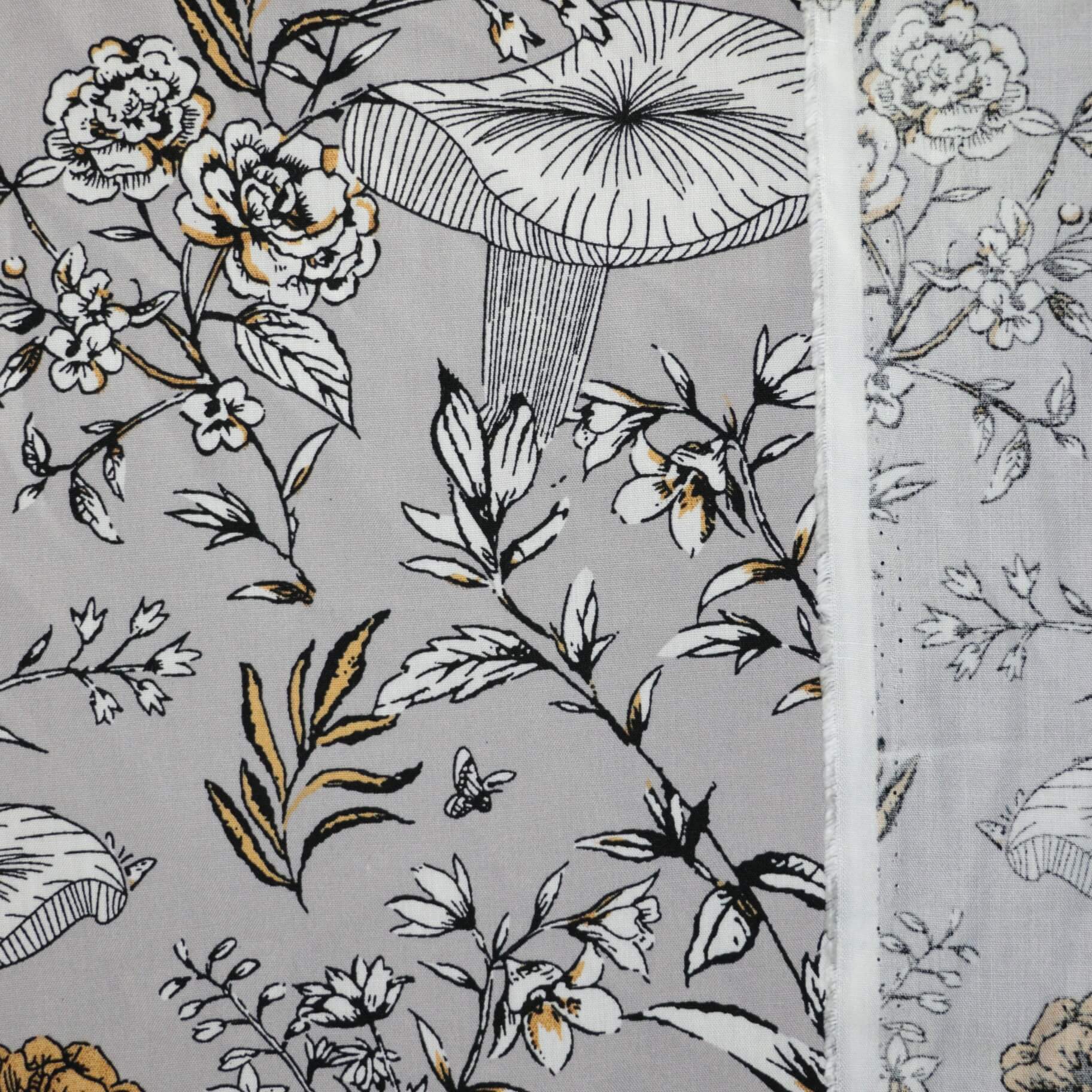 Floral and leaf pattern on a gray background