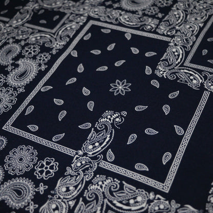 Black bandana with white paisley patterns