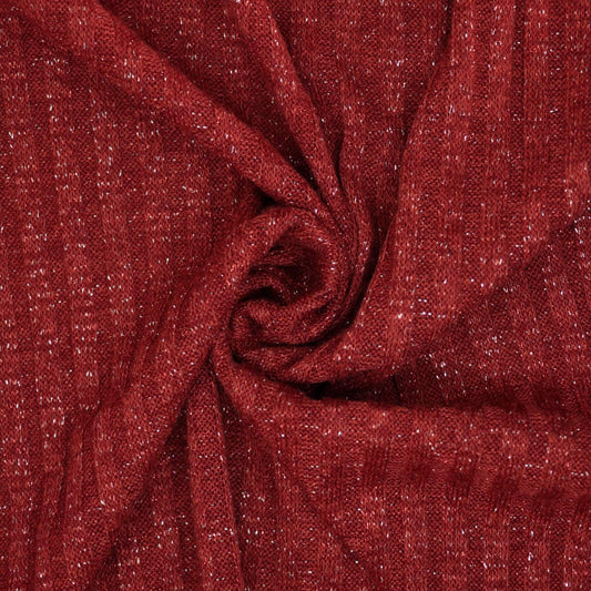 Close-up of red fabric with a textured pattern