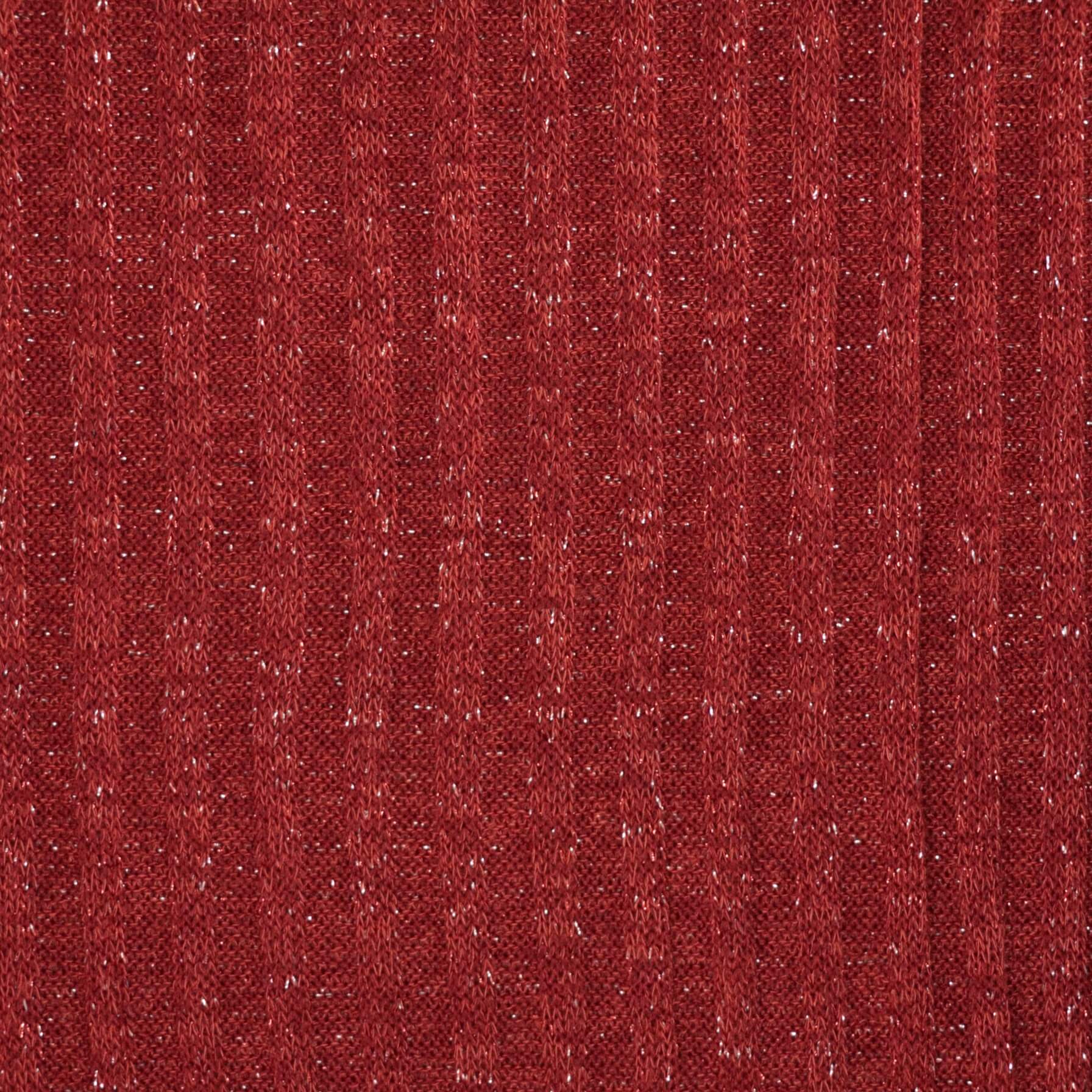 Close-up of a textured red fabric pattern