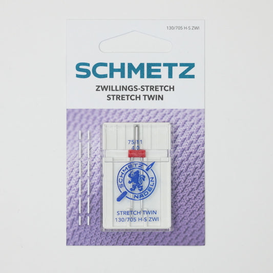 Schmetz 4mm Stretch-Twin sewing needle, Size 75 in its original retail packaging, featuring a white and purple card with the brand name and product details.