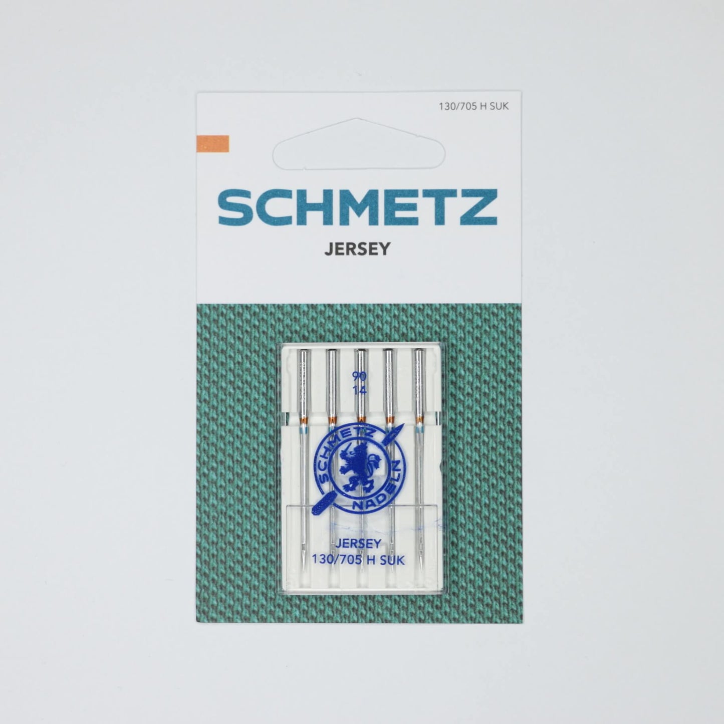 Pack of Schmetz jersey needles on a light gray background