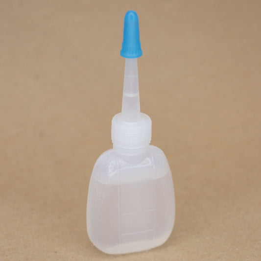 Small Sewing Machine Oil In Plastic Bottles With Lid (Contains 17ml)
